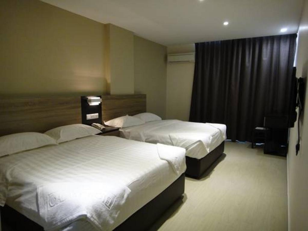 Galaxy Hotel Simpang Ampat  Kamer foto